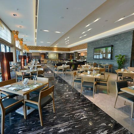 Ramee Grand Hotel And Spa Manama Luaran gambar The restaurant