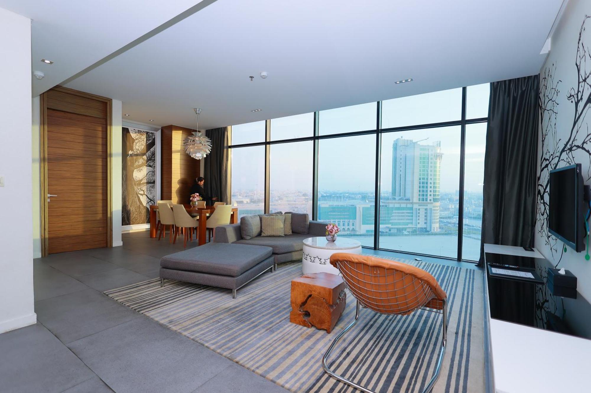 Ramee Grand Hotel And Spa Manama Luaran gambar Interior of a typical apartment