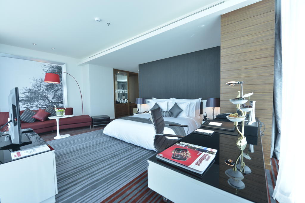 Ramee Grand Hotel And Spa Manama Bilik gambar A bedroom at the hotel